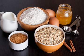 oatmeal, flour, milk and eggs - the ingredients for baking cookies