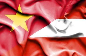 Waving flag of Austria and Vietnam