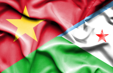 Waving flag of Dijbouti and Vietnam