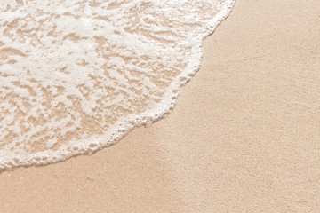 Fototapeta na wymiar Soft wave on sandy beach
