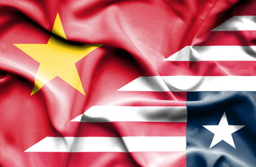Waving flag of Liberia and Vietnam