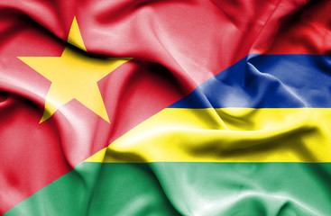 Waving flag of Mauritius and Vietnam