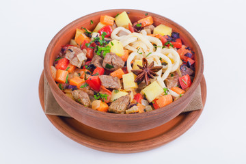meat with vegetables carrots potatoes pot cardamom