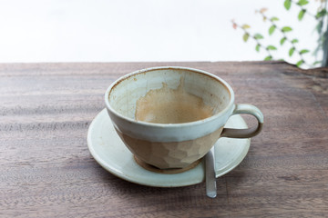empty coffee cup wiht coffee stain