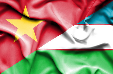 Waving flag of Uzbekistan and Vietnam
