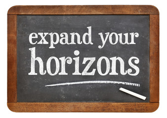 Expand your horizons blackboard sign