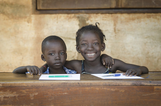 Embracing Education: Couple of African Boy and Girl Smiling School