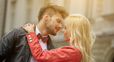 Young funny pretty fashion vintage hipster couple having fun out