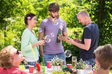Friends enjoying garden party