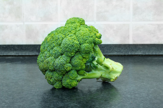 Green fresh vegetables. whole broccoli on the table