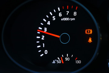 car dashboard speedometer tachometer macro