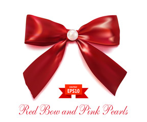 Red satin bow with a pearl pearl isolated on a white background.