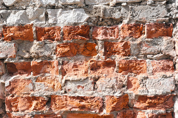 abstract background from a damaged brick and masonry