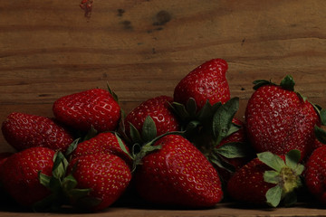 strawberries on a black background