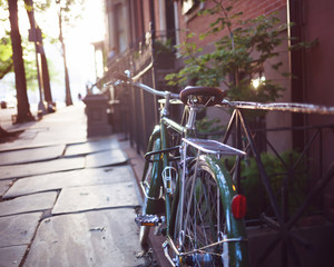 Fototapeta na wymiar Bicycle in a fence in Brooklyn Heights