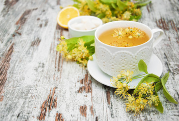 cup of herbal tea with linden flowers