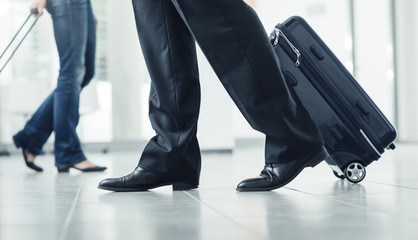 Fototapeta premium Passengers moving with luggage
