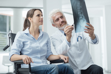 Doctor examining a patient's x-ray