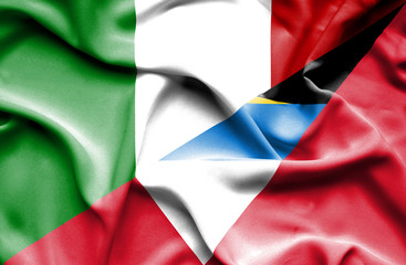 Waving flag of Antigua and Barbuda and Italy