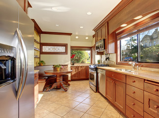 Standard kitchen with tile floor.