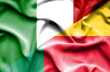 Waving flag of Benin and Italy