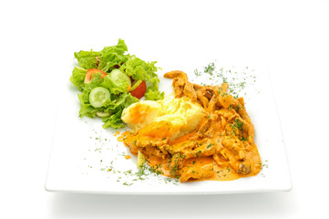 Beef stew with mashed potatoes isolated on white.