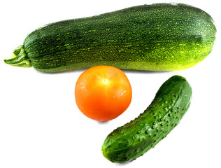 Composition from cucumber, tomato and vegetable marrow isolated on white