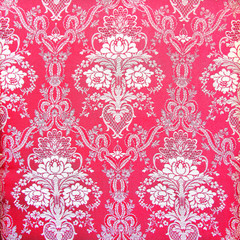 Red vintage fabric with gold decor