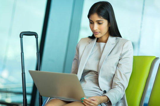 indian businesswoman using laptop
