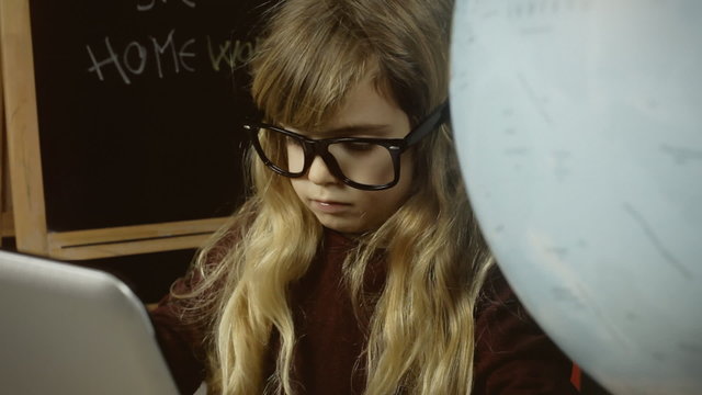 Little girl school pc world map CU