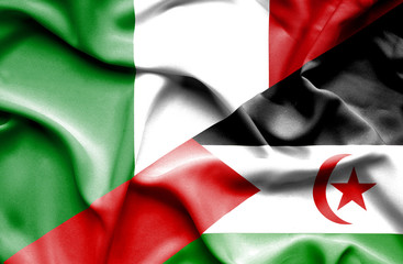 Waving flag of Western Sahara and Italy