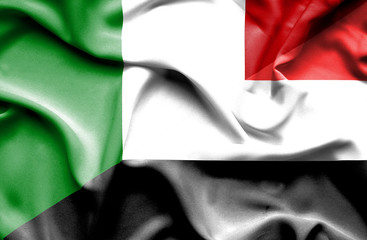 Waving flag of Yemen and Italy