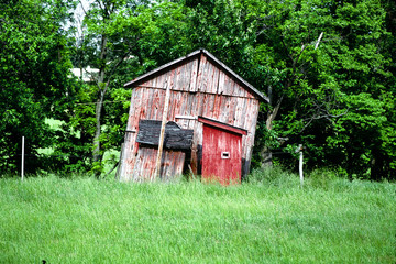 weathered, tilting shed