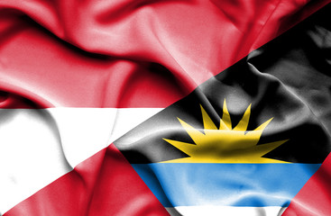 Waving flag of Antigua and Barbuda and Monaco