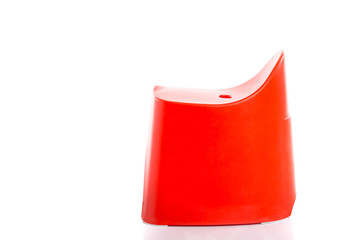 Small red plastic stool for kids