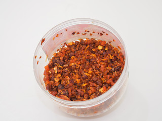 Chili Paste Dried in the Bowl on white background.