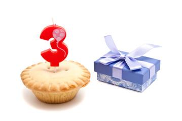 three years birthday candle with cupcake