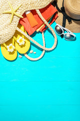 beach accessories on the blue wooden board