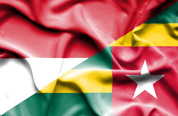Waving flag of Togo and Monaco
