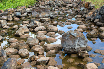 transparent water and stones on bottom