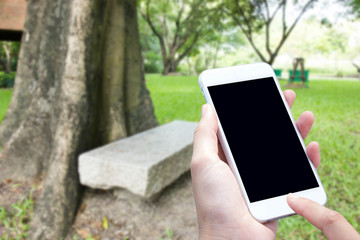 woman hand hold and touch screen smart phone