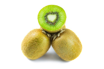 Kiwi fruit and split half isolated on white