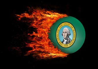 US state flag with a trail of fire - Washington