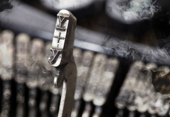 Y hammer - old manual typewriter - mystery smoke