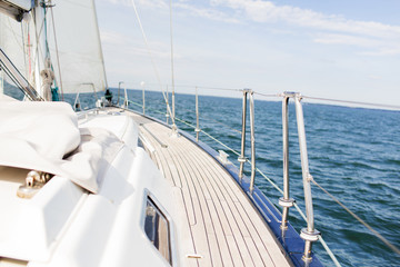 close up of sailboat or sailing yacht deck and sea