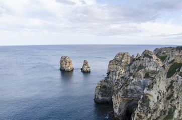 Fototapeta na wymiar Lagos rocks and Atlantic Ocean view in Algarve, Portugal