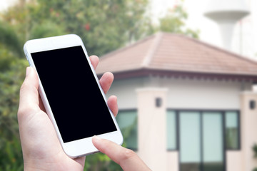 woman hand hold and touch screen smart phone