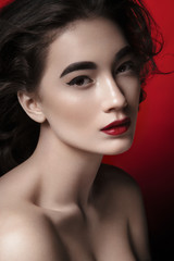 Nice girl. Studio.Red Background. Beauty portrait. - 86767672