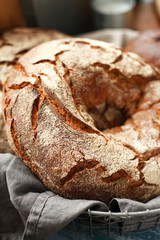 Round rye bread on a napkin