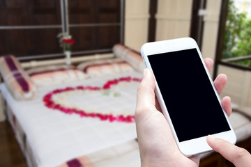 woman hand hold and touch screen smart phone